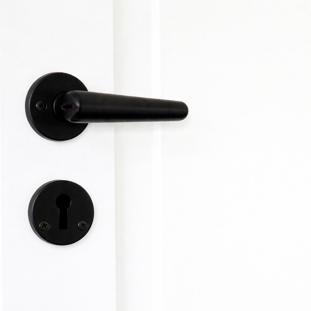 Torpedo dørhåndtag i sort bakelit med roset & nøgleskilt