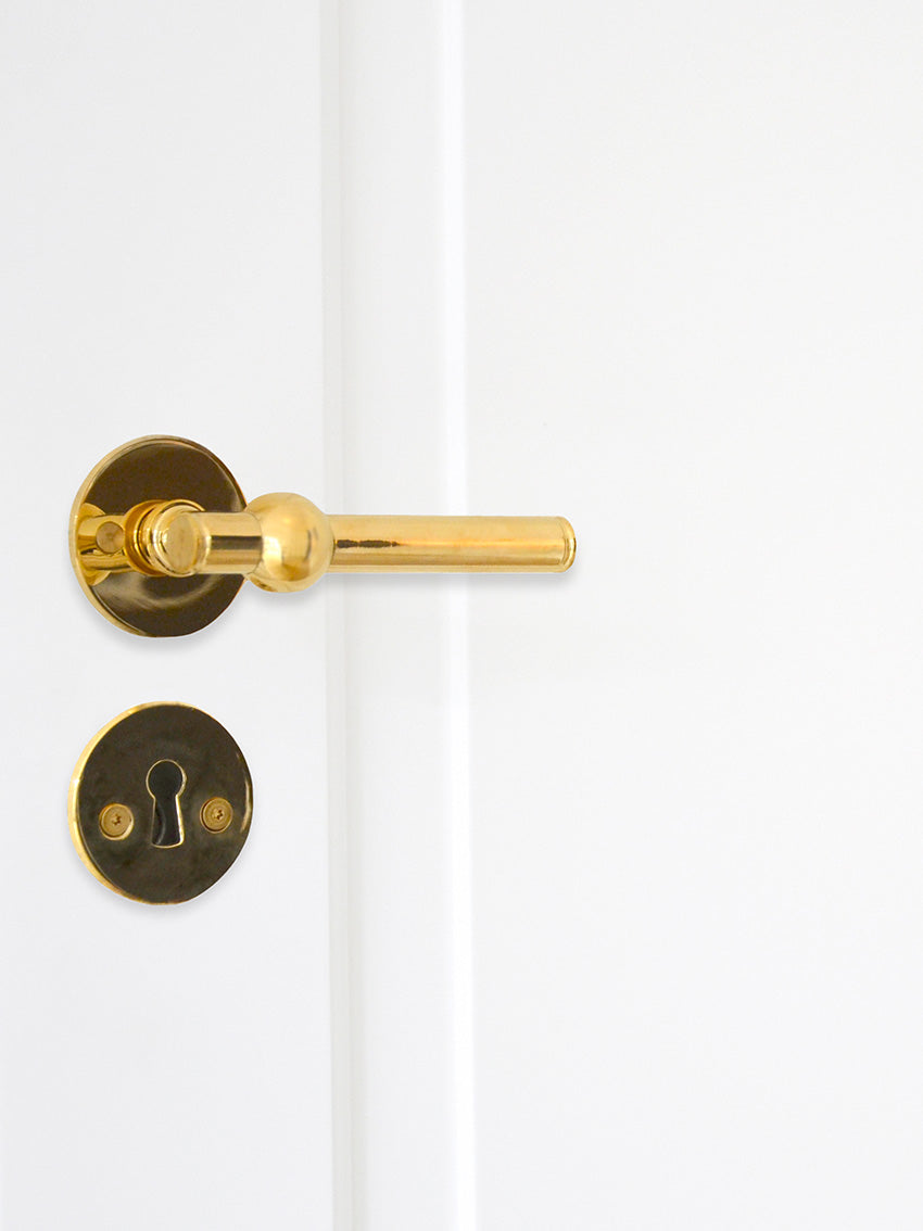Skodsborg door handle bright brass